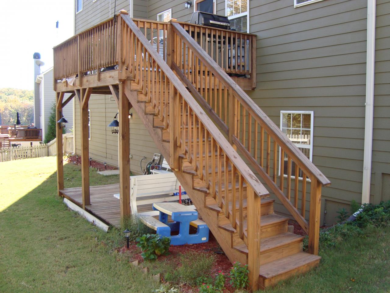 Side view of the new staircase, railing, and gate