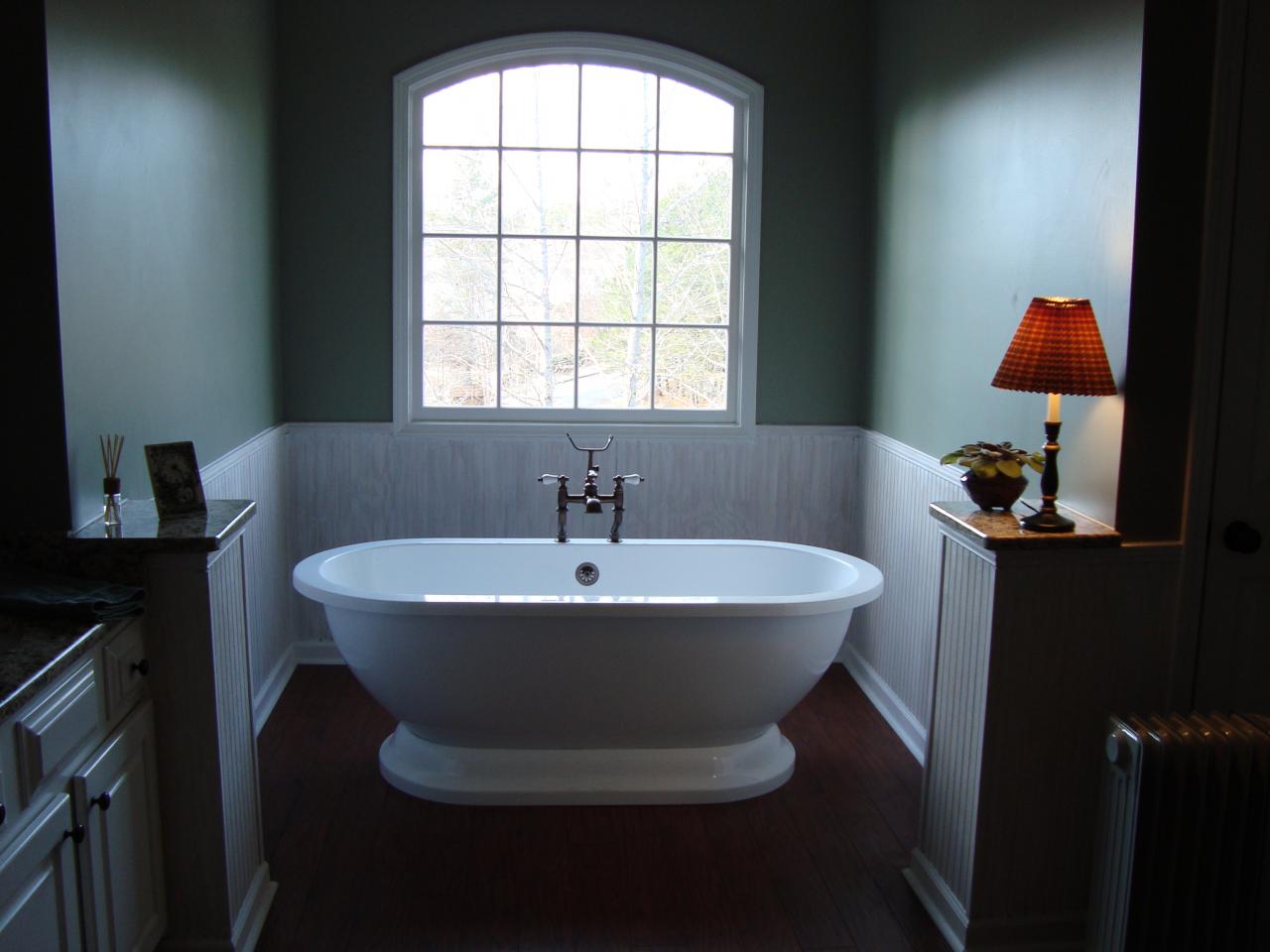 Freestanding soaker tub with bead-board wainscoting
