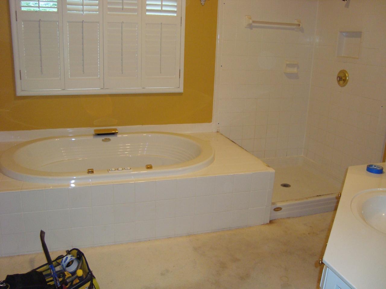 Before &mdash; original builder-grade tub and shower